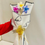 Clutcher Bouquet with Mixed Color clutcher, White Paper Wrap, Gold Ribbon, I Love You Message Border for Romantic Gifting - Image 7